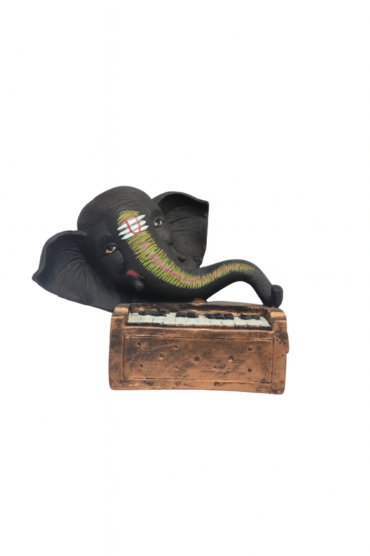 Ganesh Ji Idol Playing Harmonium