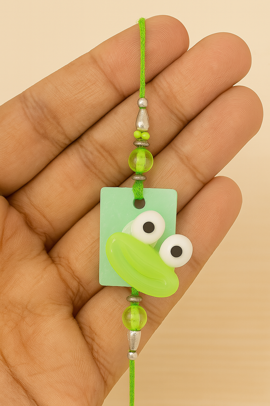 Cute Frog Rakhi for Kids 🧒 – Soft Rubber Cartoon Design