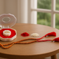 Designer Rudraksha Rakhi with Golden Nazar Charm |
