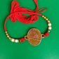 Elegant Traditional Rakhi with Golden Diya Design