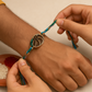 🧿 Traditional Rakhi with Multicolor Thread